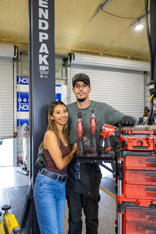 Tyler and Thalia in the shop